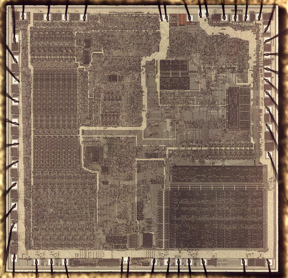 Die photo of the 8086, showing the metal layer. Around the edges, bond wires are connected to pads on the die. Click for a large, high-resolution image.